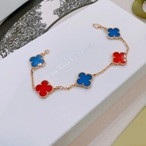 Van Cleef & Arpels Gold Bracelet with Red and Blue Motifs